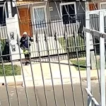 suspeito-preso-visto-portao-casa-vitima
